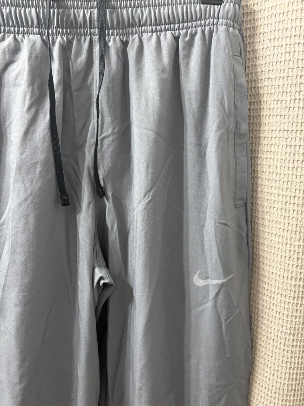 Nike Light Gray Performance Track Pants with Black Drawstring
